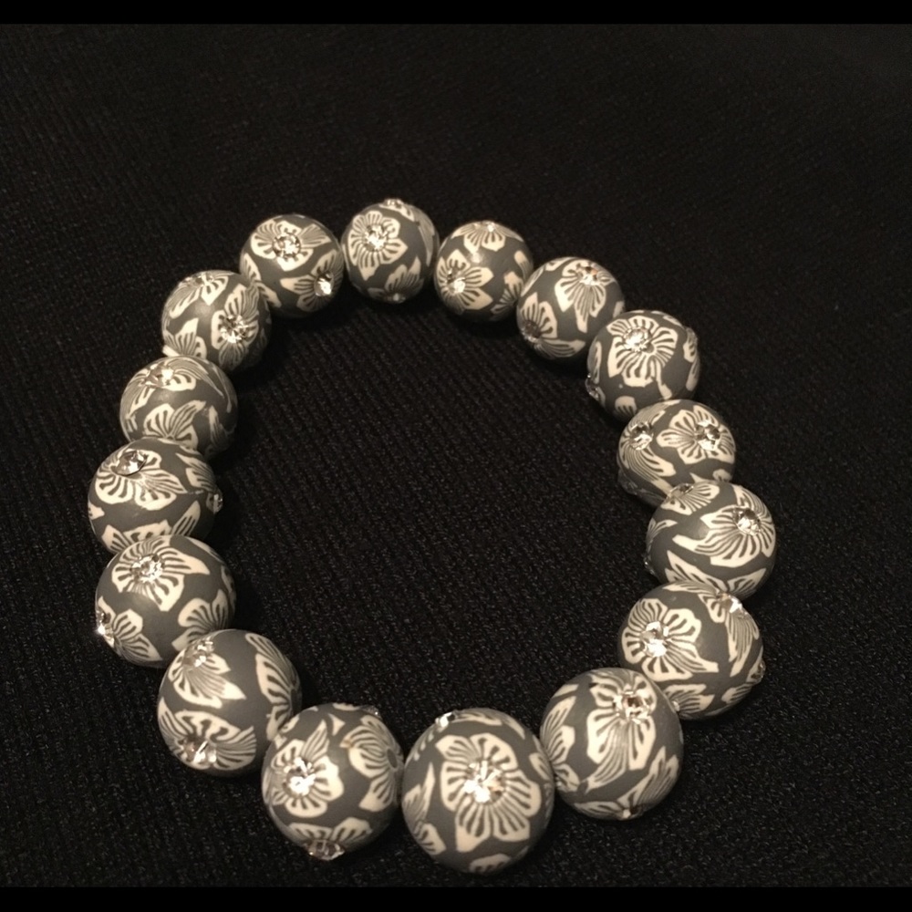 Silver tone etched floral bracelet